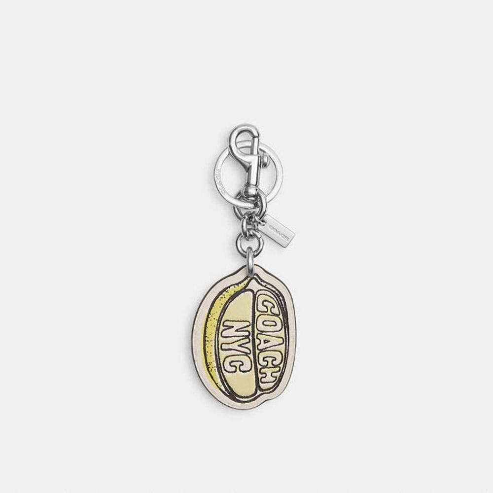 NWT Coach lemon Bag Charm, Silver Hardware, dust bag included (CAO55)